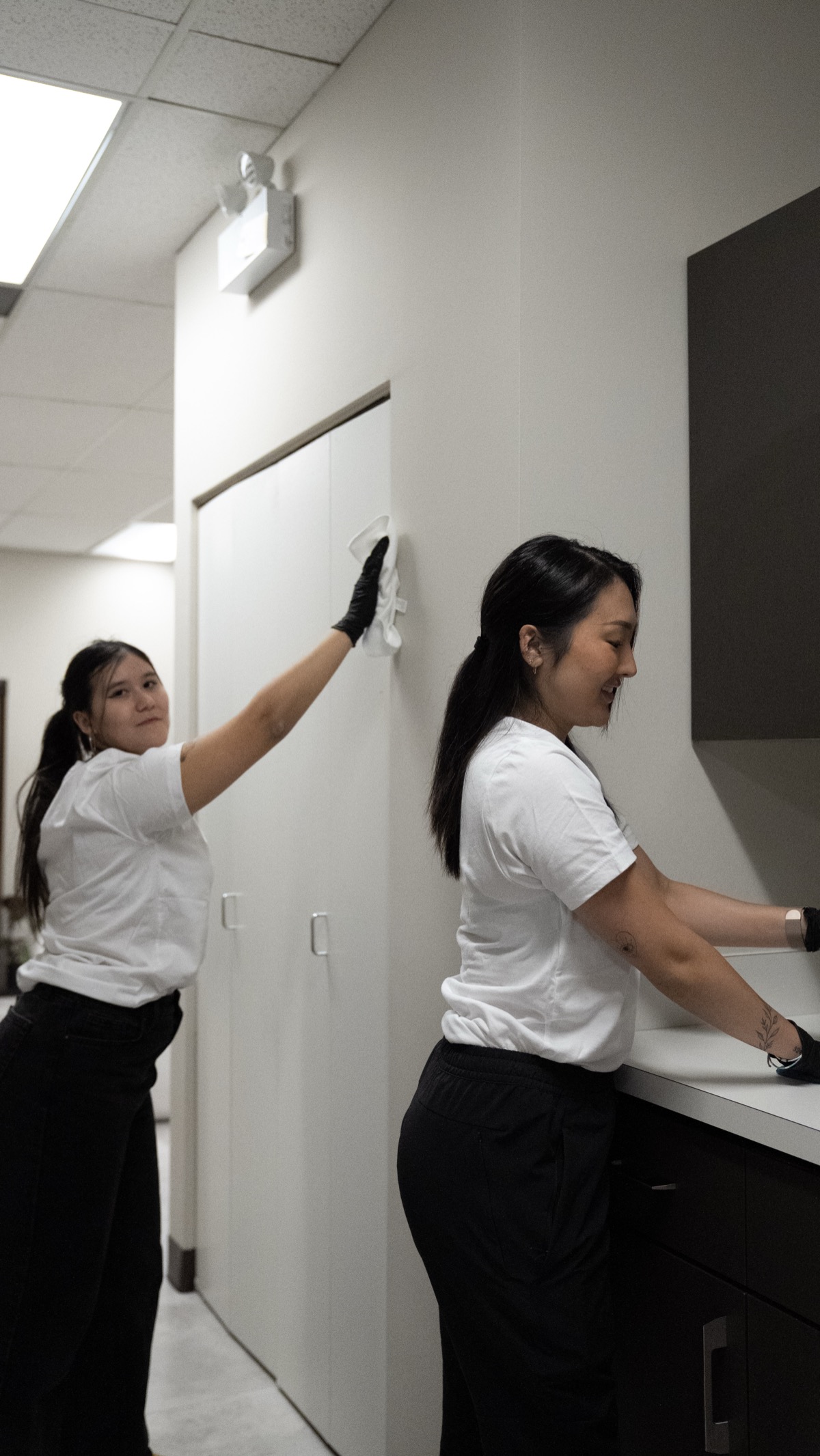 Pixel Cleaners team deep cleaning walls and surfaces during move-out in Metro Vancouver